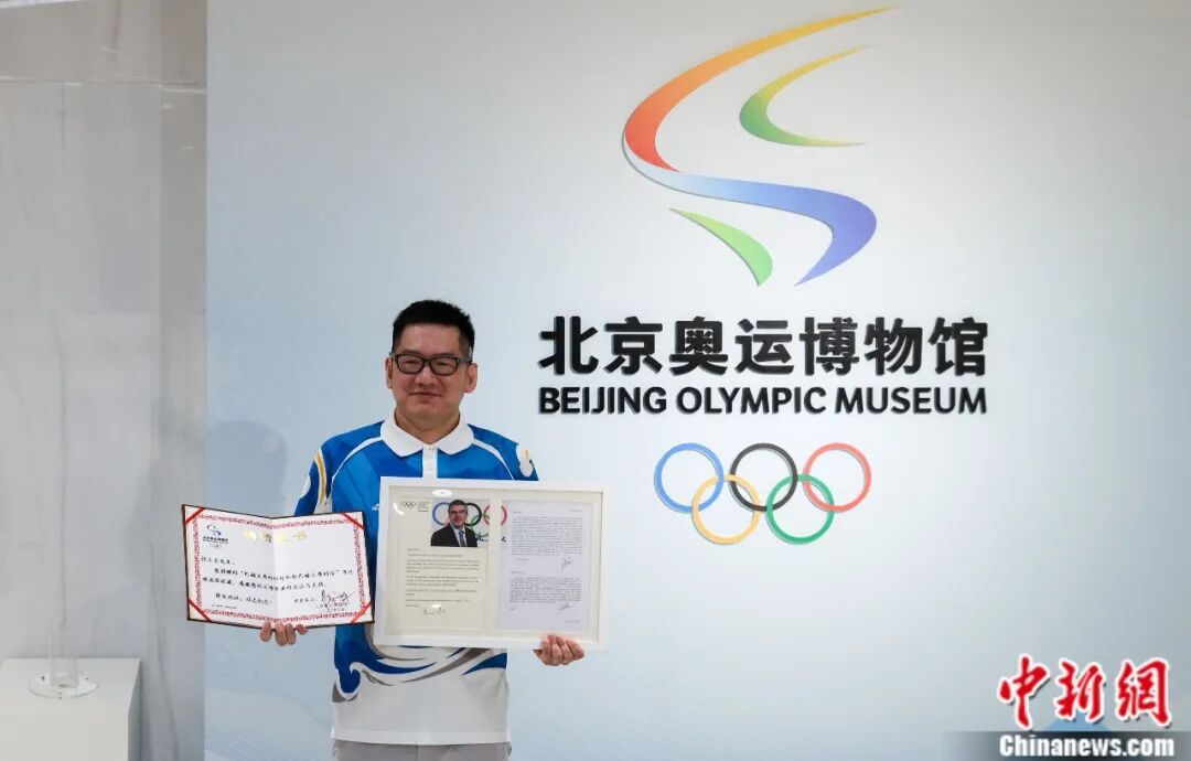 “奥运小王子”张文全：从奥运火炬收藏者到传递者(图4)